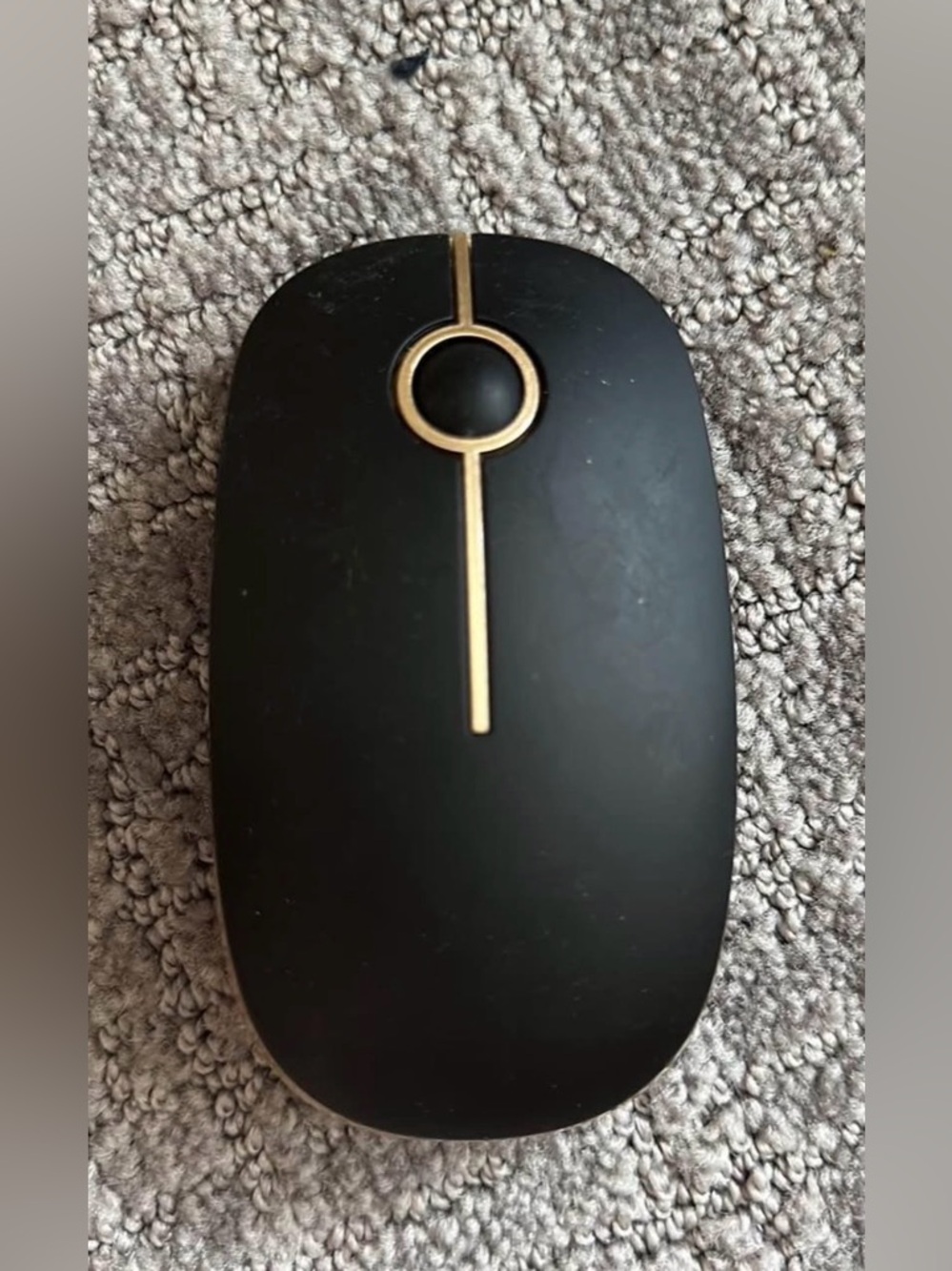 Sleek Black Wireless Mouse with Gold Accents
